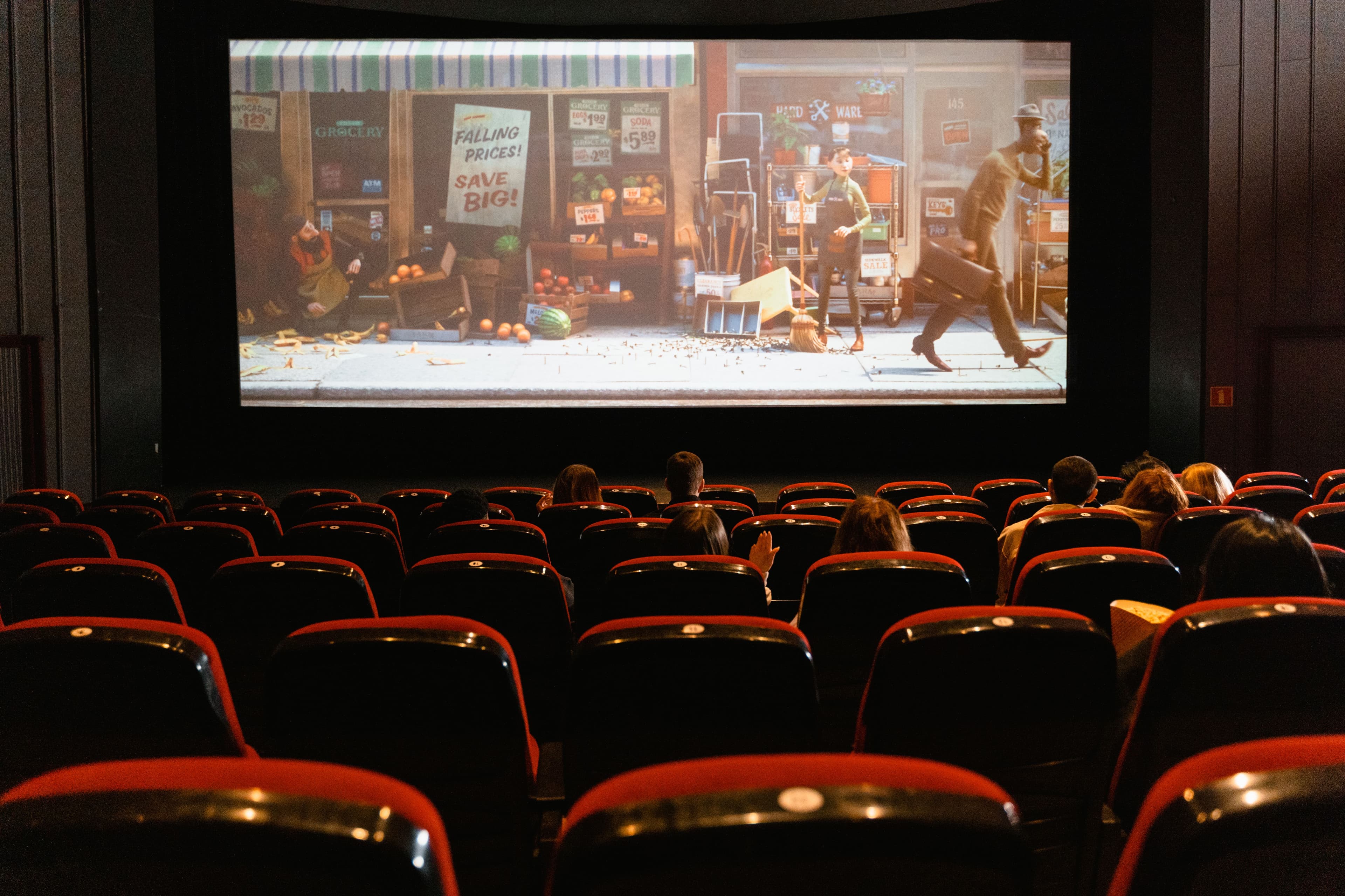 A home theater setup with projector, surround sound, and IPTV playback