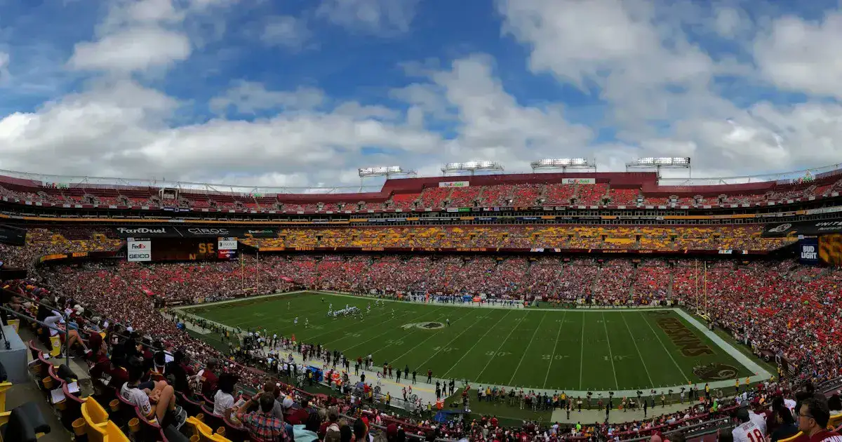 American football stadium filled with fans before a game